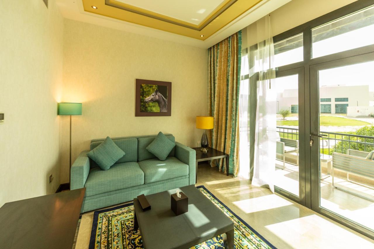Retaj Salwa Resort & Spa Ad Dawhah Esterno foto A living room at the resort